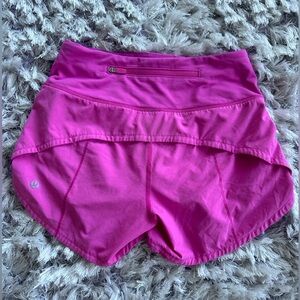 Lululemon speed ups 4 inch shorts in sonic pink. They are in size 0